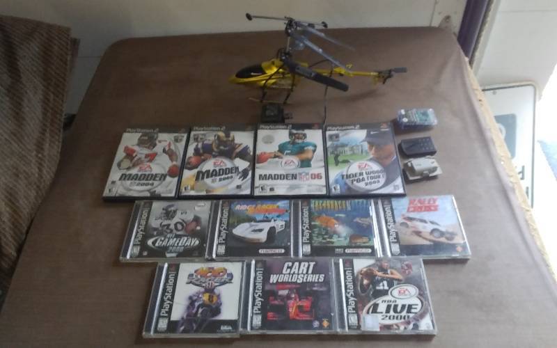 lot 21 image: Box Lot Of Play Station Video Games, RC Helicopter-No Remote