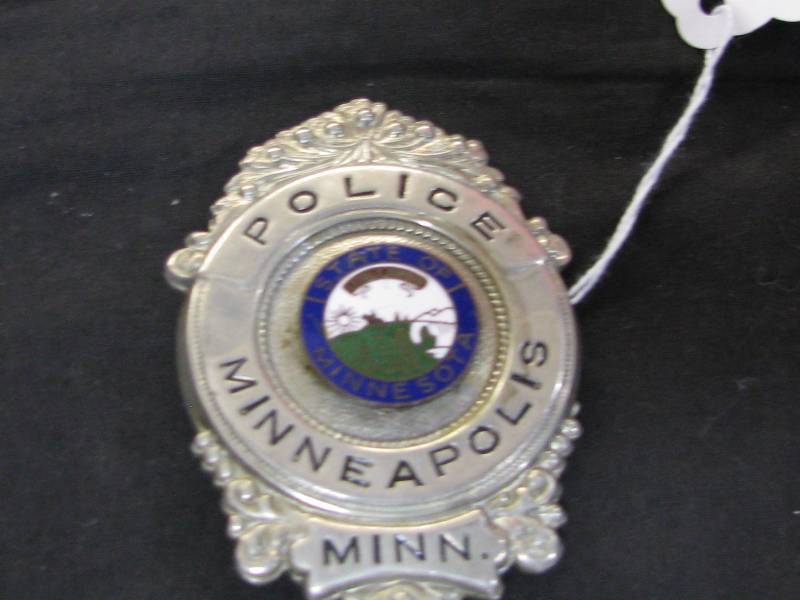 lot 6 image: Minneapolis Police Retired Badge
