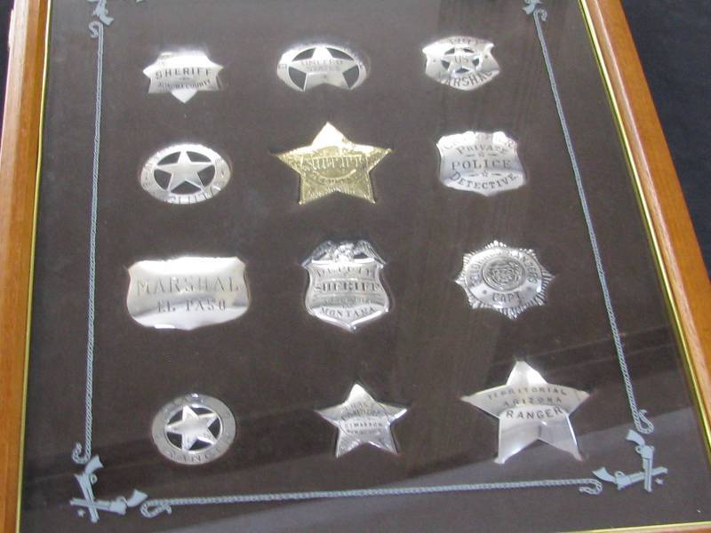 lot 11 image: Franklin Mint Great Western Lawmen Badges