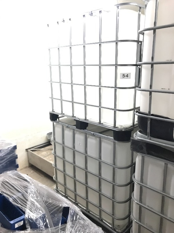 2 POLY FLUID TANKS WITH SPIGOTS  VALVES