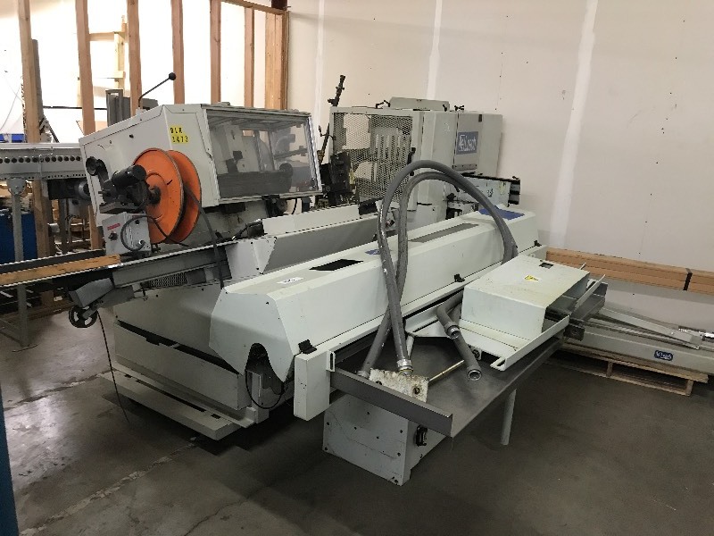 AUTOMATED PROCESS FEEDER DRILL MACHINE