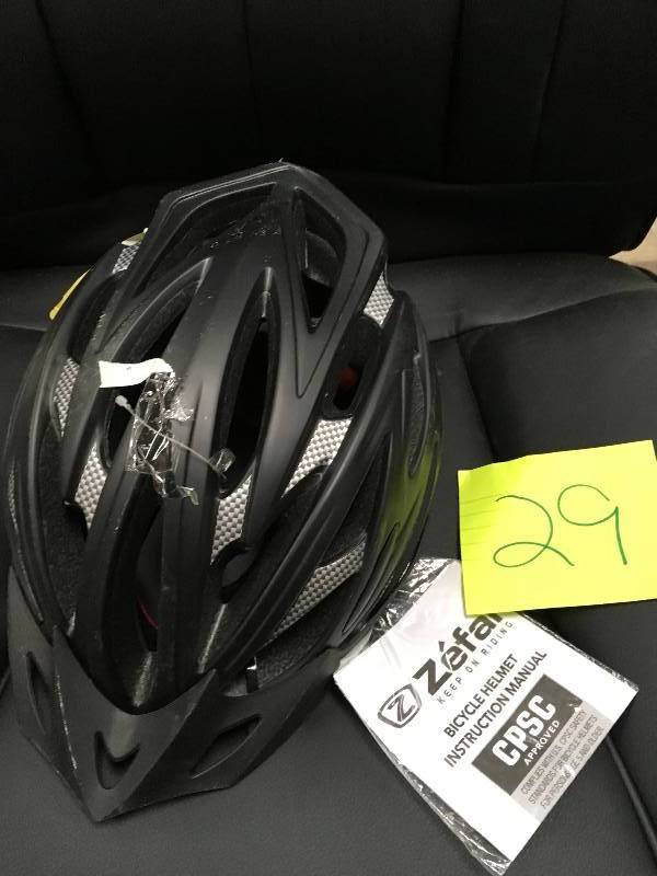 Black biking helmet in good condition
