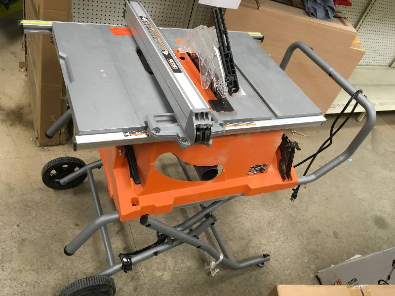 RIDGID 15 Amp 10 in. Heavy-Duty Portable Table Saw with Stand in good condition
