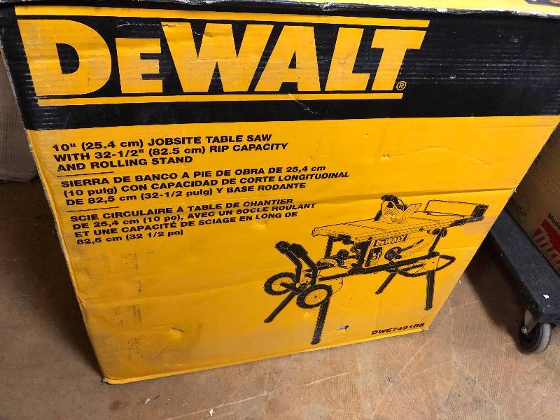 DEWALT 15-Amp Corded 10 in. Job Site Table Saw with Rolling Stand in like New working conditions