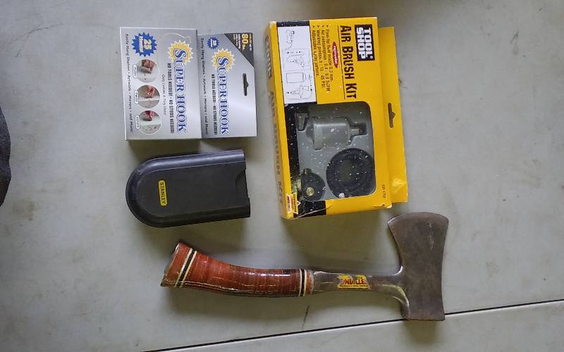 lot 35 image: Air Brush Kit, Stanley Estimator, Wall Hooks, Hatchet