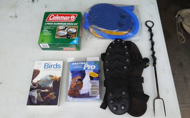 lot 47 image: Coleman Mess Kit, Pump, Bird Books, Yak Trax