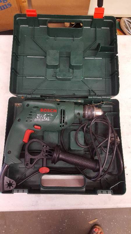 lot 62 image: Bosch 12 Inch PSB500 RE Drill With Case