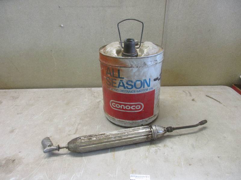 lot 44 image: Grease gun and gas can