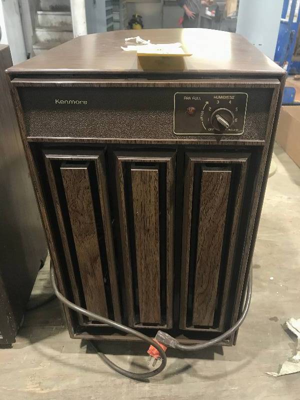 lot 60 image: Kenmore, JCPenney wood grain dehumidifiers