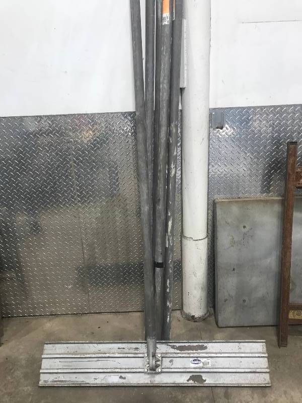 lot 106 image: Cement bull float and extension handles