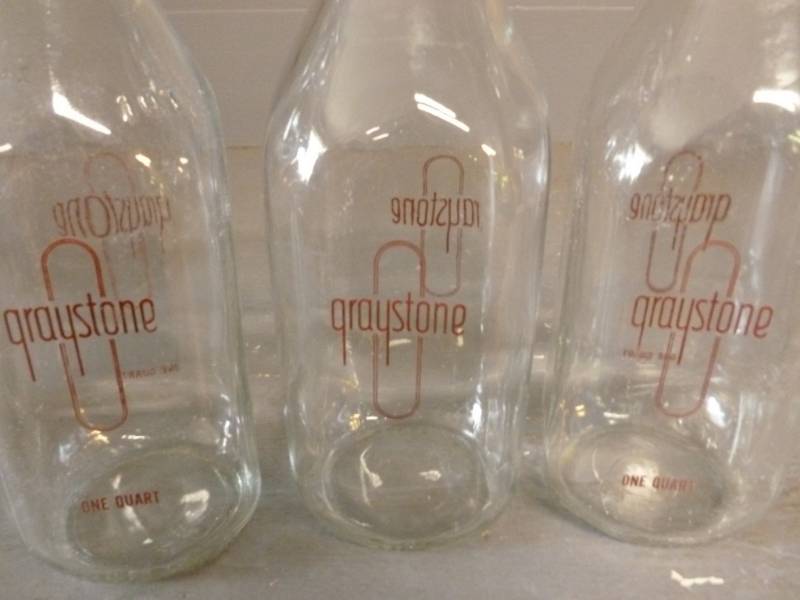 lot 128 image: Vintage Milk Bottles