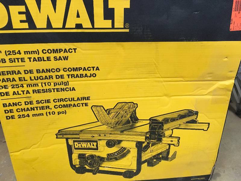 lot 69 image: Dewalt Compact job site table saw in good condition Model # DWE7480
