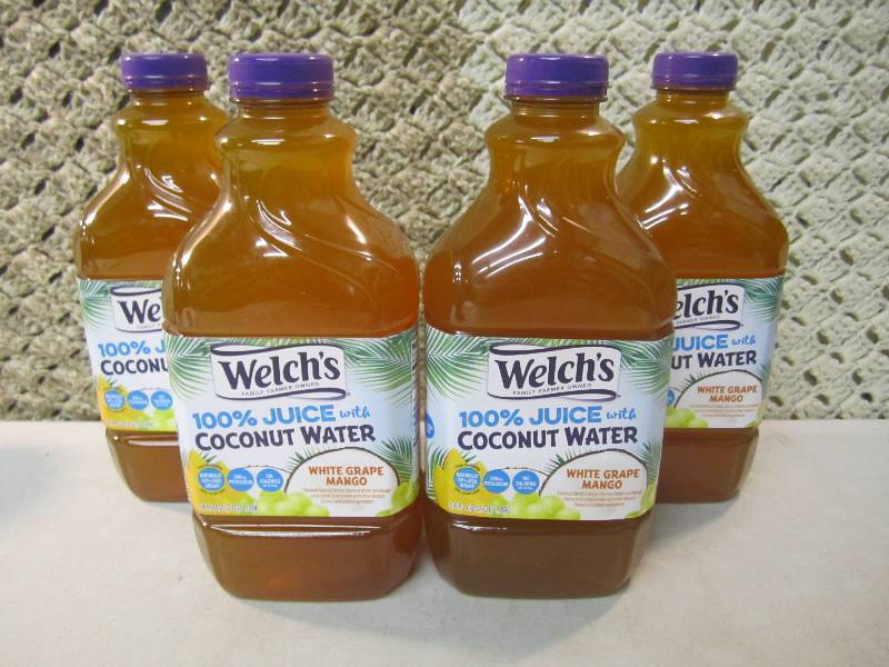 lot 18 image: 4 Bottles Welchs White Grape Mango...