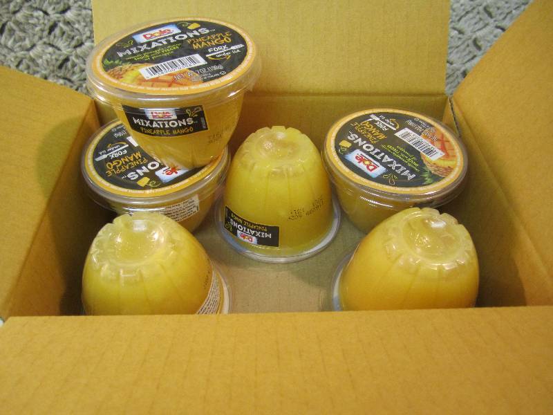 lot 192 image: Case of 12 Dole Mixations Pineapple...
