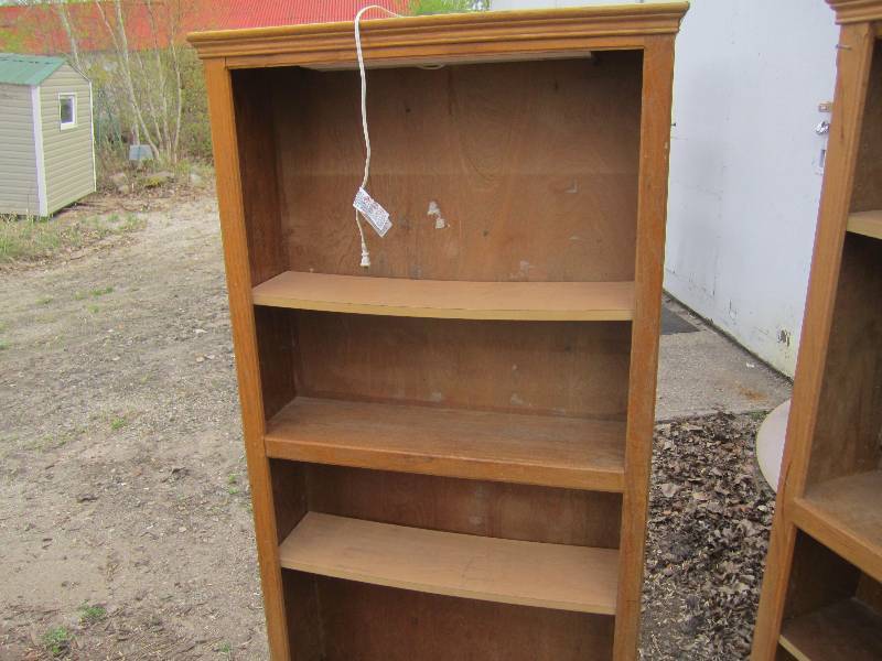 lot 316 image: 2 Wood bookcases, both are lighted, one has slat wall back for display hooks
