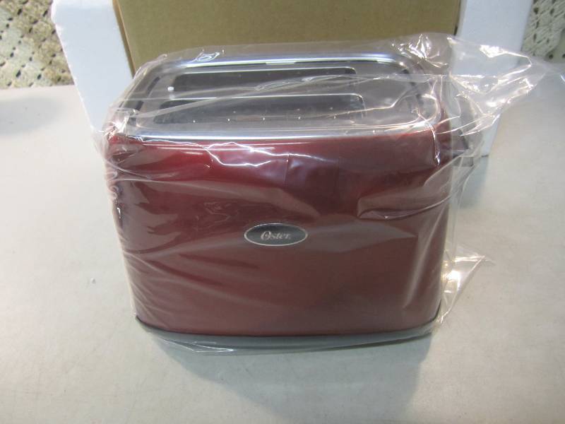 lot 307 image: Oster Toaster Red Retail $29.99  CS...