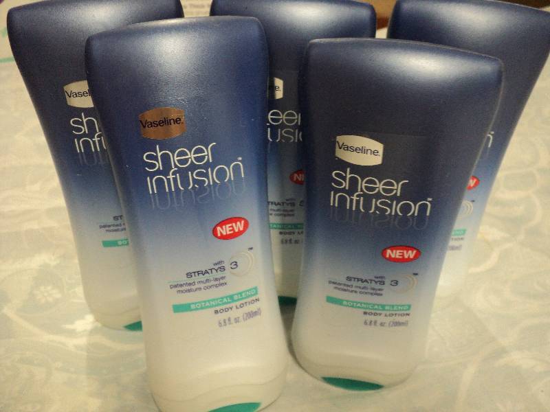 lot 27 image: 5 full bottles of Sheer Infusion...
