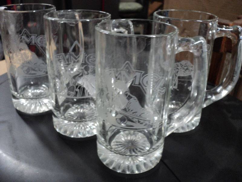 lot 30 image: 4 Camel mugs...