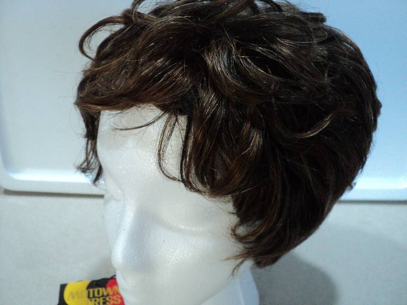 lot 106 image: Motown Tress Frost wig...