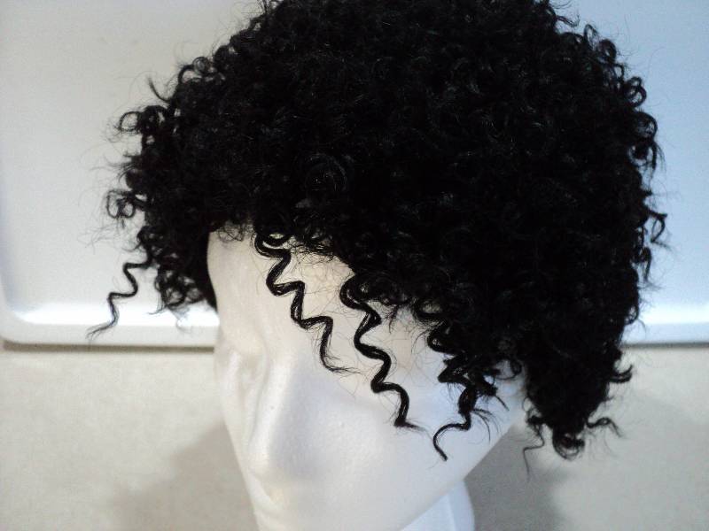 lot 107 image: Ashro Maggie off black wig...