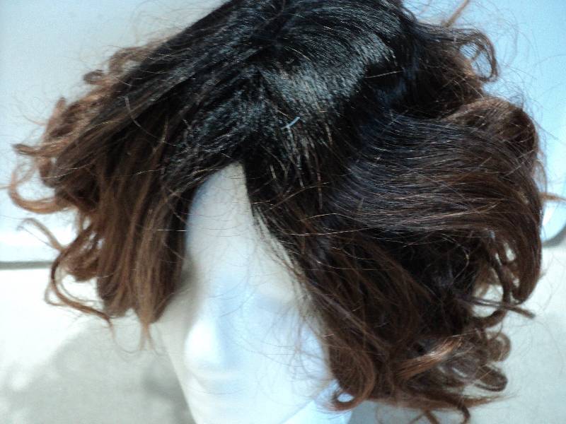 lot 110 image: Ashro Kelli dark honey blonde wig...