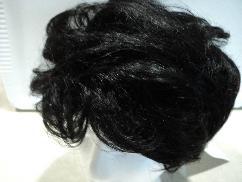 lot 119 image: Ashro Sharon off black wig...