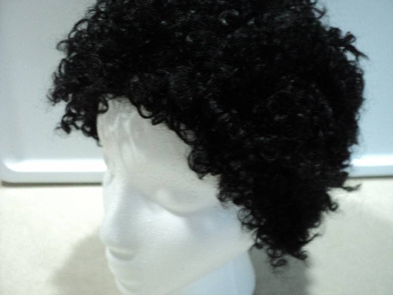 lot 121 image: Ashro Maggie off black wig...