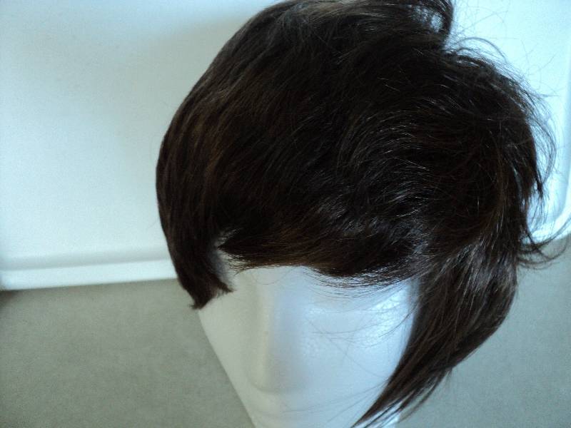 lot 135 image: Midnite Velvet brownblond wig...