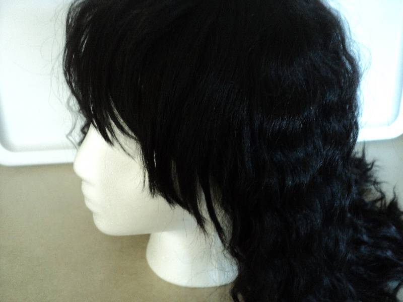 lot 139 image: Ashro off black wig...
