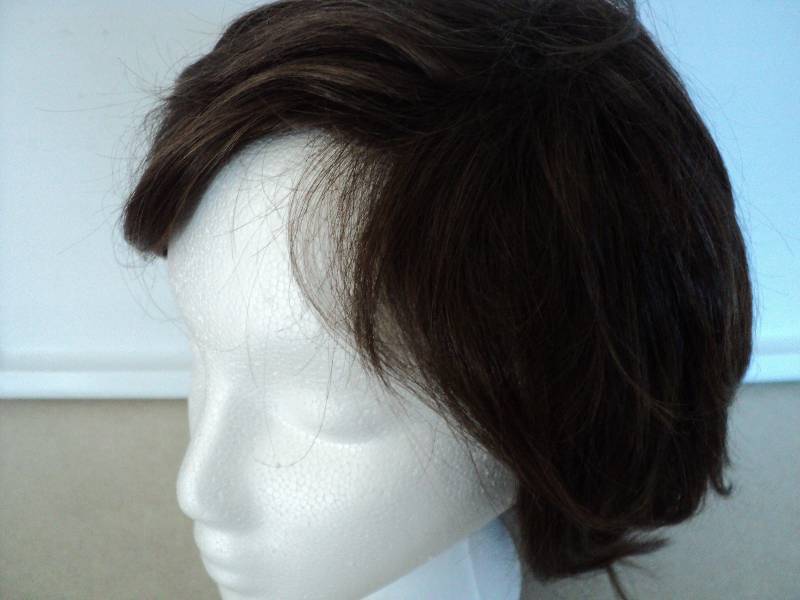 lot 141 image: Eva chestnut wig...