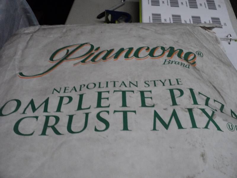 lot 151 image: 4 bags of Piancone Pizza Crust Mix ...