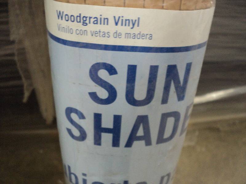 lot 338 image: Wood grain vinyl Sun Shade 60 x 72...