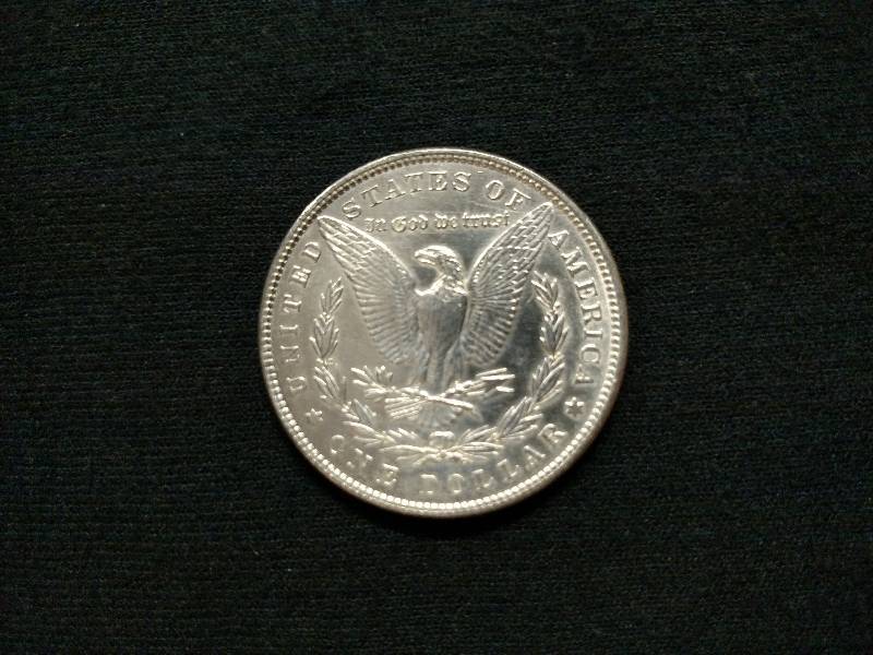1886 AU Morgan Silver Dollar...