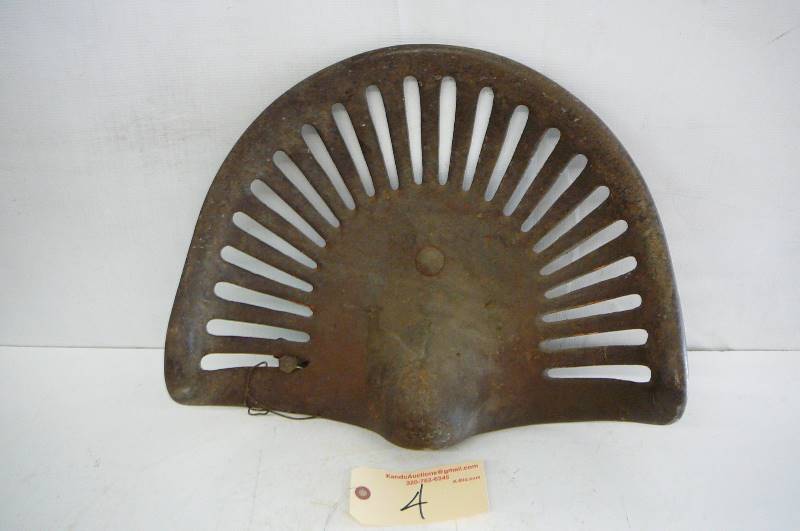 lot 4 image: Cast iron tractor seat