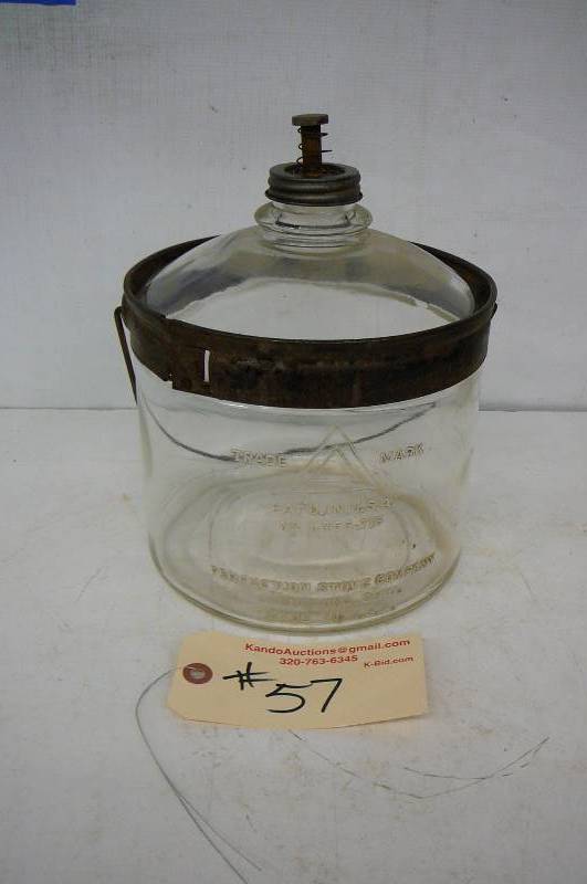 lot 57 image: Glass Fuel bottle, Perfection Stove Company