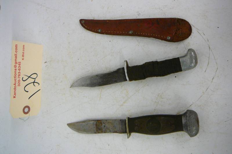 lot 128 image: Knives, 1-Remington umc, 1 unknown