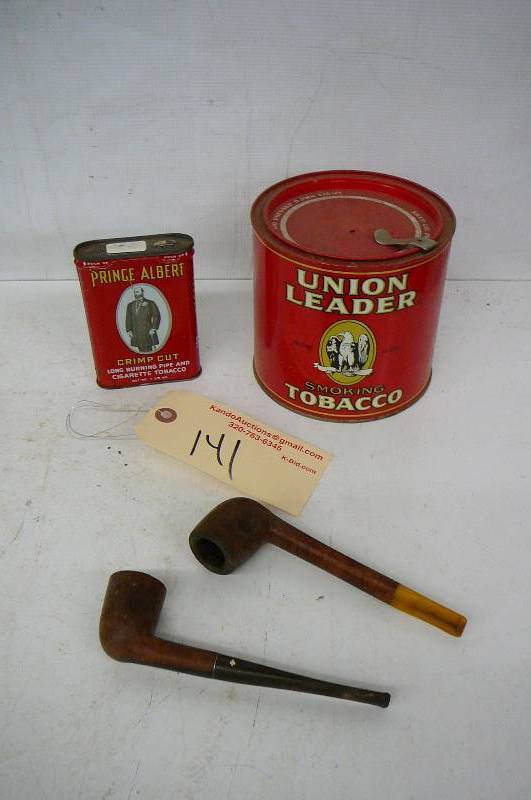 lot 141 image: Tobacco Tin & Pipes