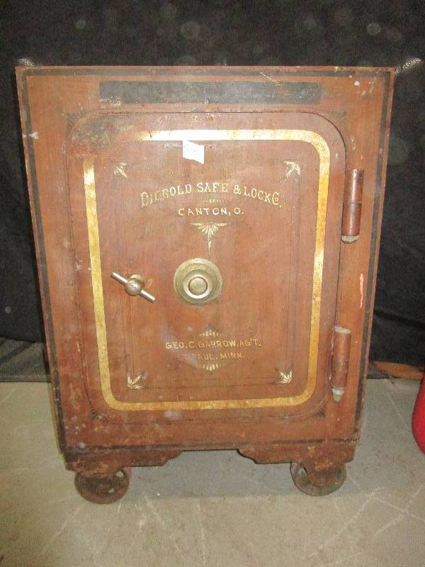 lot 1 image: Diebold Safe & Lock Co Safe with steel wheels and combination.