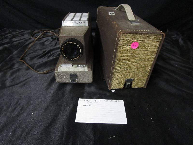 lot 28 image: Model 708 Bell & Howell Slide Projector Works