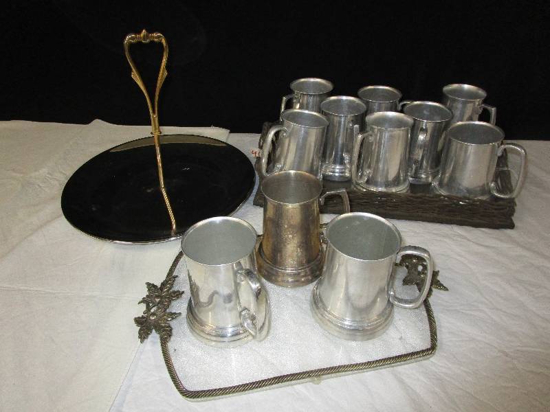 lot 41 image: 11 mugs wglass bottoms and serving tray, plus another 2 Serving Trays