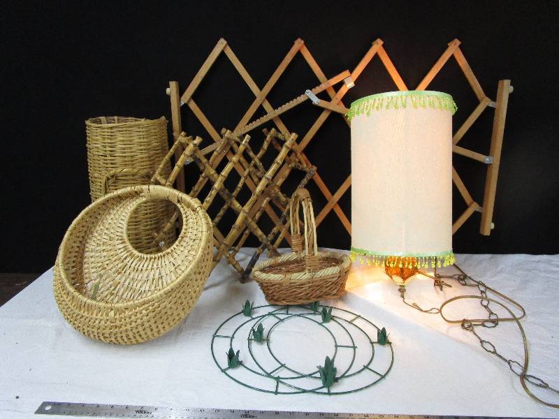 lot 88 image: Hanging Lamp, assortment of wooden baskets, wooden gate, medal candle holder, bamboo wine rack, misc
