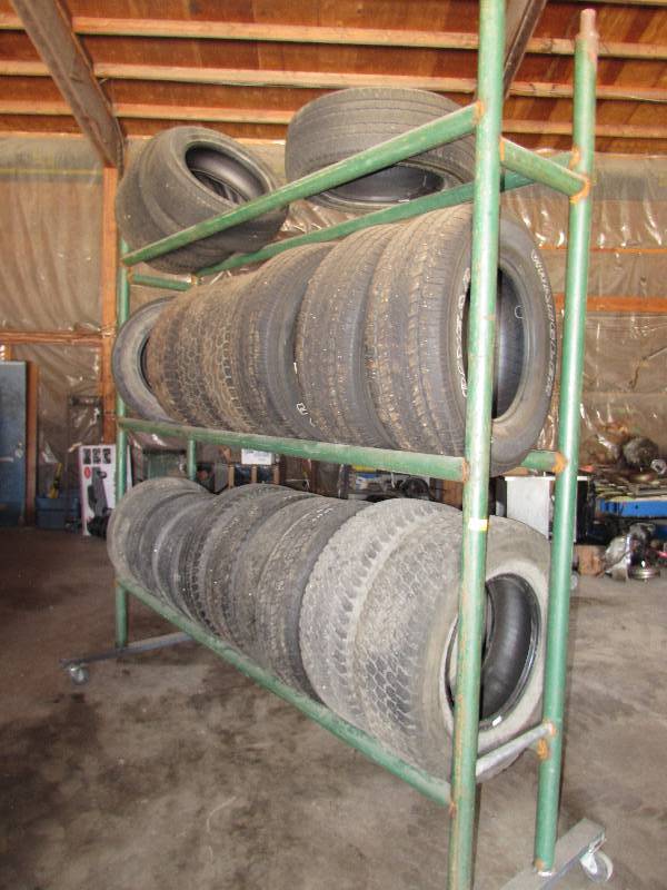 lot 151 image: TIRE RACK ON CASTERS, ALL TIRES INCLUDED