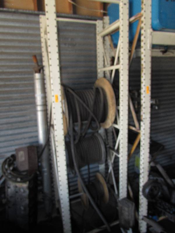 lot 153 image: METAL RACK WITH SPOOLS OF HOSE