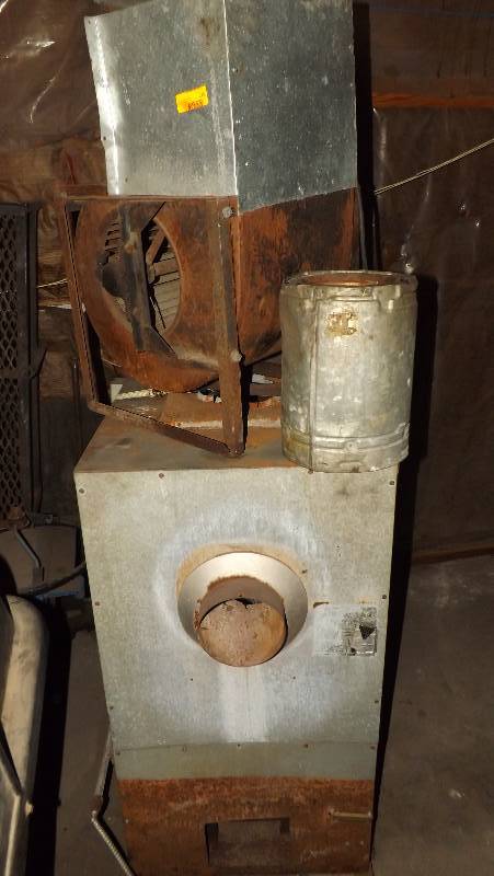 lot 215 image: WOOD BURNING STOVE