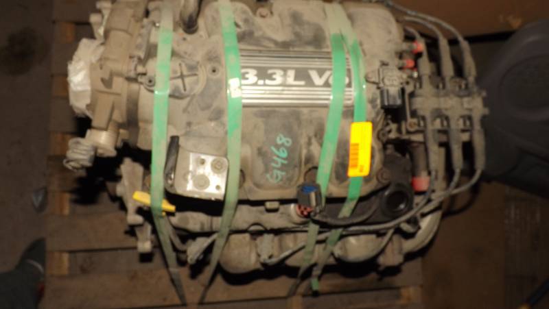 lot 218 image: 3.3L V6 ENGINE, STILL STRAPPED TO THE PALLET, WORKING ENGINE