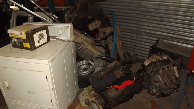lot 229 image: LARGE LOT OF ENGINES, DRYER, AND MISC CAR PARTS