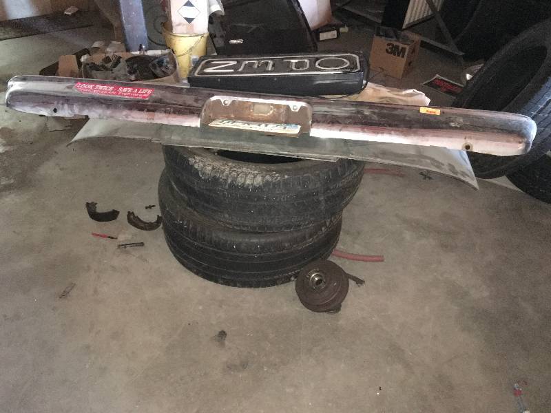 lot 171 image: OPEN SIGN, TIRES AND BUMPER