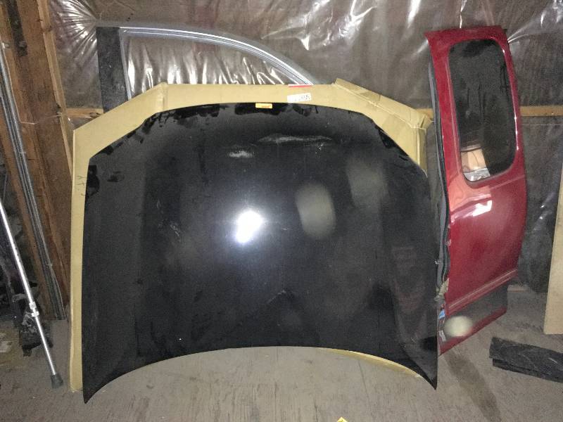 lot 188 image: AUTO HOODS AND DOORS