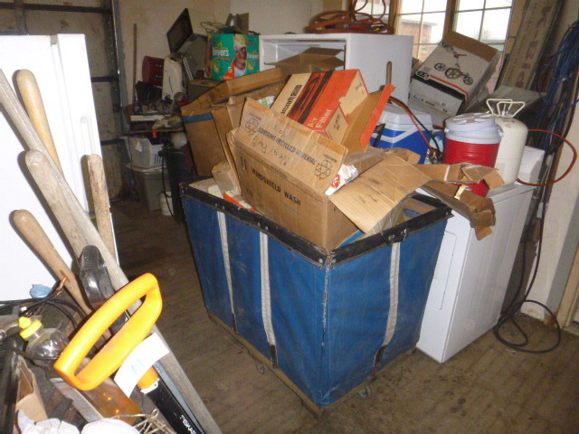 lot 27 image: Bin Full of Old Ford Parts