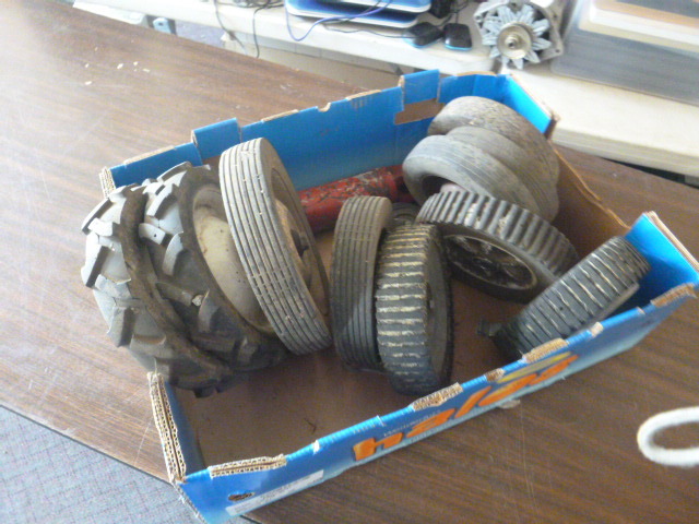 lot 80 image: Box of Used Lawn Mower Tires
